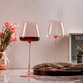 Oblique pink red wine glasses