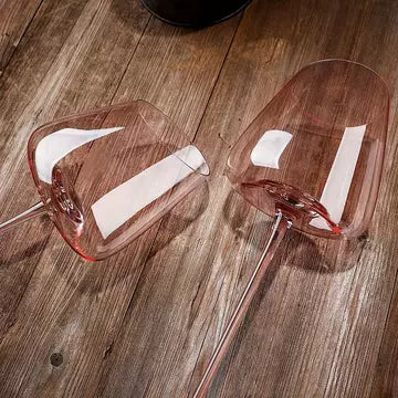 Oblique pink red wine glasses