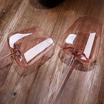 Oblique pink red wine glasses